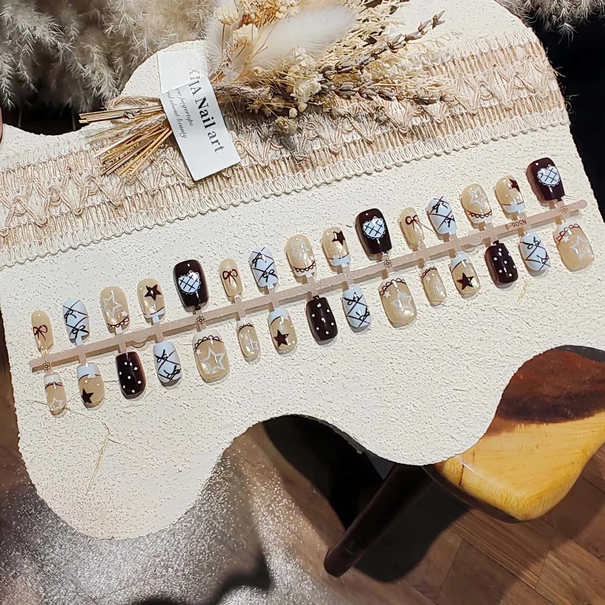 Sumusinsiniset kissansilmätekokynnet, rusetti- ja tähtikuviolla